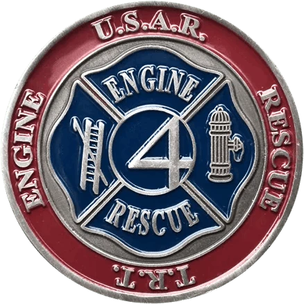 A close-up of a circular challenge coin with a red and blue design.